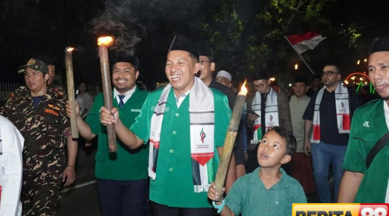 gelar pawai obor kemanusiaan gp ansor tahun baru islam jadi momentum muhasabah dan solidaritas global